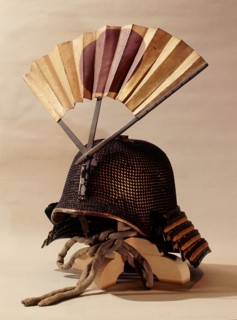 Helmet adorned with a war fan