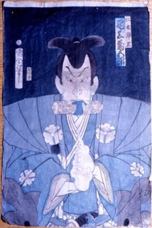 An ukiyo e print of a ninja making a secret finger sign