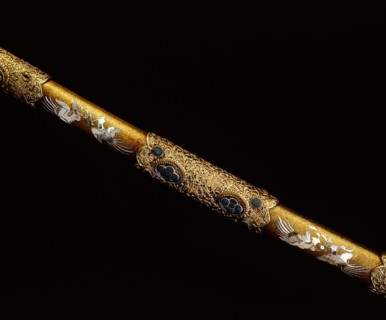 Detail of the scabbard of the court sword Kazadachi, made in deliberate imitation of a sword of the Heian era, with elaborate enamel and gilt work
