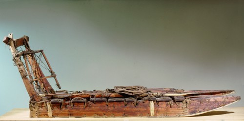 Polar Eskimos had very little wood so, in order to make this sled they had to combine several small pieces of wood and ivory, and lash them together with sealskin rope