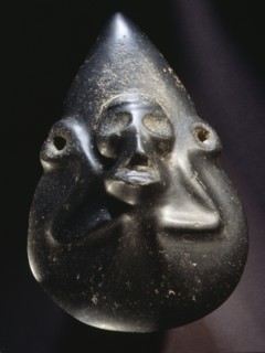 Taino stone ceremonial object with schematic head