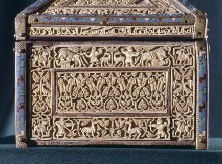 Detail of a casket of wood with gilded leather and ivory plaques