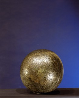 A perforated globe intended as an incense burner
