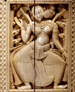 A panel showing a dancing apsara