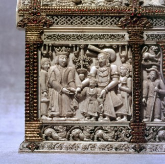 Detail of low relief carving on an ivory casket decorated with gold and rubies