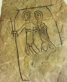 Stele from the early Christian period, inscribed with an image of a couple thought to be stepping through the gates of paradise