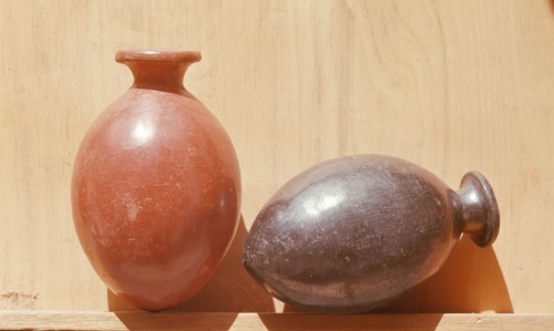 Two small burnished red ware and black ware vessels