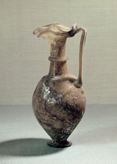 Glass vase with elaborate spout