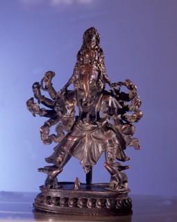 Five headed ten armed tantric form of the god Ganesha with both feet on his vehicle, the rat