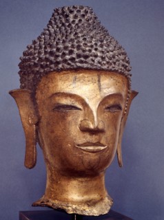 A head of a Buddha in the style of the Lan Na School