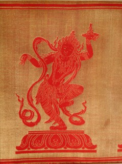 Sino Tibetan silk and gold brocade altar cloth depicting eight auspicious emblems interspersed by puja devis (offering goddesses) who offer gifts to the five Dhyani Buddhas, or Buddhas of meditation