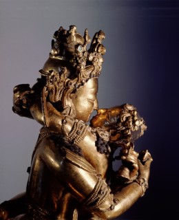 A yab yum icon of Vajrasattva, also known as Vajradhara, the Supreme Buddha, identified by his hands which are held in the Vajrahumkara mudra, a thunderbolt in each, with the Supreme Wisdom Visvatara