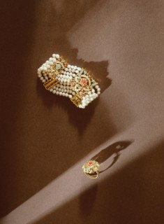 A five strand pearl bracelet with gold fittings, with a ring