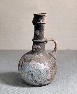 Vases like this are often found in Roman burials filled with perfume for the dead