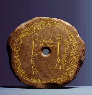 Lid of a cremation urn with fertility symbols