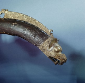 Detail of the dragon headed terminal on the Sollested horse collar