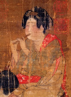 Detail of an anonymous painting Banquet and Concert which depicts elegant ladies of the Tang imperial court enjoying a feast and music