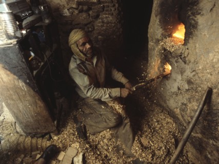 Blacksmith at his forge