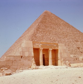 Near the southeast corner of the pyramid of Cheops stands the restored columned portico of the family tomb of Seshemnefer