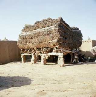 Aligned to the four cardinal points and roofed by a thick layer of millet stalks, the men's house or Togu Na, is the focal point of male society in every Dogon village