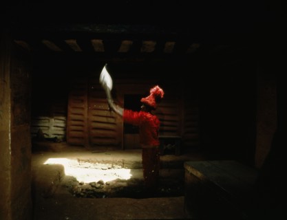 Sword ceremony of Chief Okonghae Ogiamwen, performed in the shrine in the palace courtyard