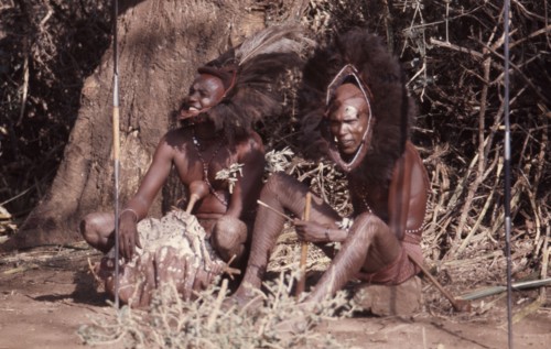 The hairstyle and beadwork of these Masai men indicate their status as warriors