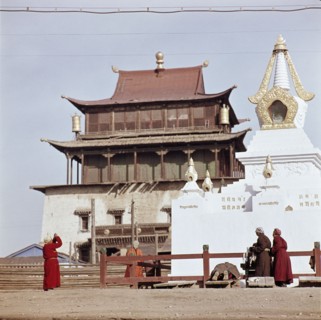 Mongolians praying at an open air shrine in the centre of Ulan Bator