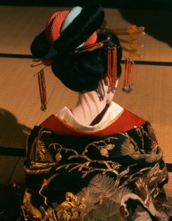 A geisha in traditional dress and make-up