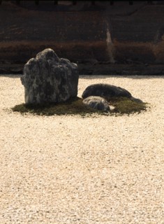 One of the groups of stones in the stone garden of Ryoan-ji temple in Kyoto