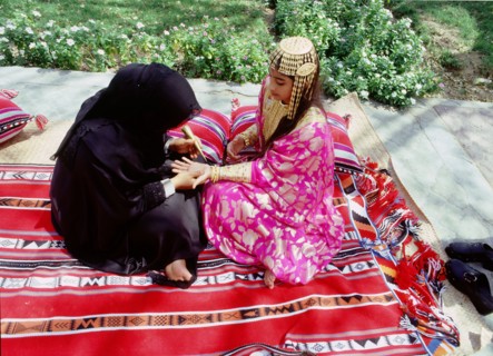 Geometric and floral decorative henna patterns were applied to adorn the hands and feet of young women on occasions such as weddings