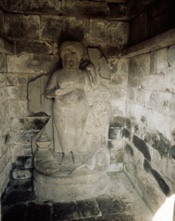 Statue in a niche from the complex of temples at Lara Jonggrang