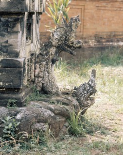 Detail showing the fusion of three dimensional and relief sculpture characteristic of Balinese stone carving