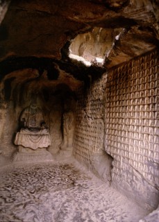 The Longmen cave-temple complex which extends for about 1000m along the Yi River