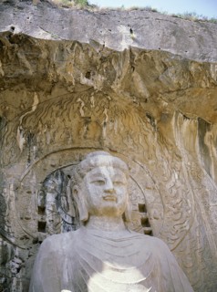 The colossal 17 metre high image of Vairocana Buddha in the Fengxian temple at the Longmen cave temples