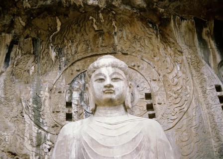 The colossal 17 metre high image of Vairocana Buddha in the Fengxian temple at the Longmen cave temples