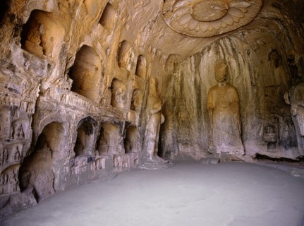 The Longmen cave-temple complex which extends for about 1000m along the Yi River