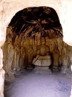 The Longmen cave-temple complex which extends for about 1000m along the Yi River