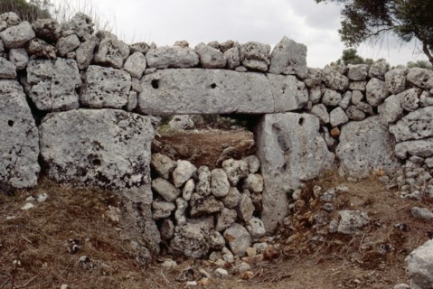 Monumental megalithic gateway set in the great wall at the fortified megalithic site of Son Catlar   Spain