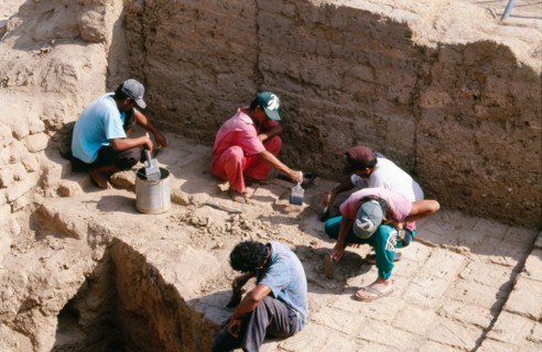 Archaeologists at work on the excavation of the temple-tomb pyramid at Sipan, Lambayeque Valley
