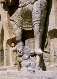 The Longmen cave-temple complex which extends for about 1000m along the Yi River