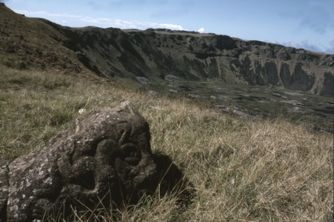 Bird-Man petroglyph by the edge of crater of Rano Kao volcano