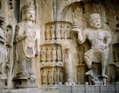 The guardian kings of Buddhism carved on the north wall of the Fengxian temple at the Longmen cave-temple complex