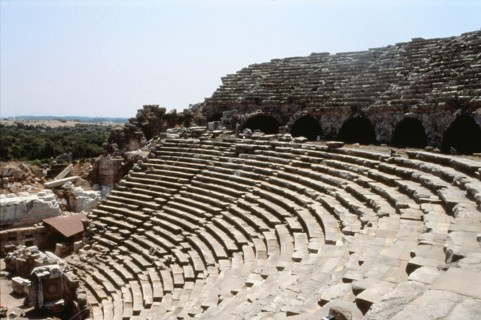 View of the upper rows of seats and arches of the supporting wall of the theatre at Side