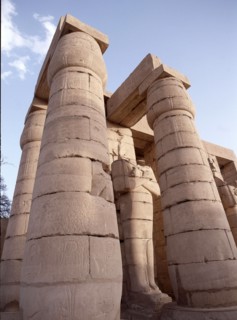 View of the Hypostyle Wall and an Osiride statue at the Ramesseum, the mortuary temple of Ramesses II