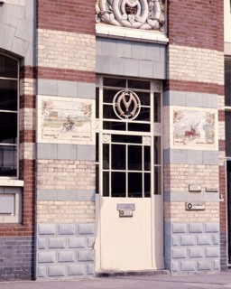 Decorative tiles of famous racing cars of the time which used Michelin tyres