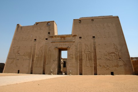 The Pylon with reliefs of the Pharaoh Ptolemy XII (Avletes) smitting his enemies in the presence of Horus the Elder