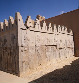 A detail of a relief carving on the staircase leading to the Tripylon at Persepolis, depicting the procession of Medes and Persians