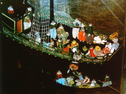 Detail from a folding namban jin or 'southern barbarian' screen depicting a harbour scene recording the arrival of exotic looking Portuguese merchants in Japan