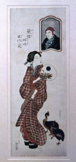 A Japanese wife looks at the portrait of her foreign husband
