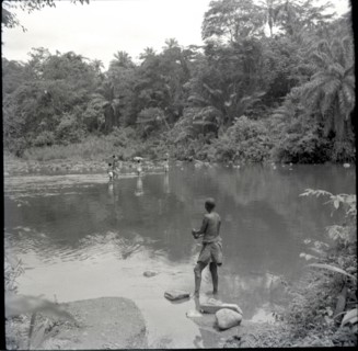 Boys crossing river